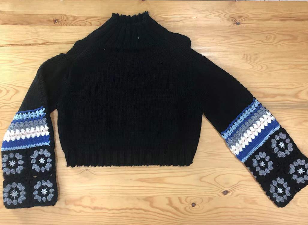 Women's long-sleeve pullover with embroidered cuff